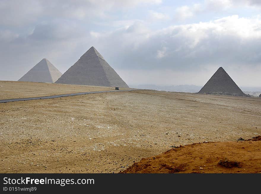 Three pyramids in gisa in cloudy weather