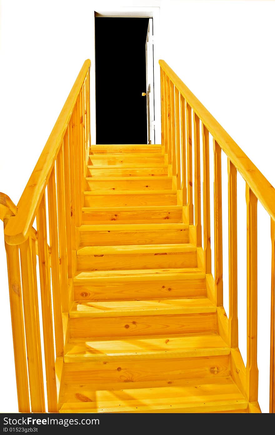 Close-up of yellow ladder going upstairs to the room which is open, dark.