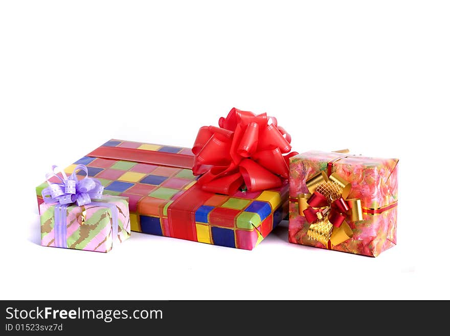 Colorful presents close-up isolated on white background