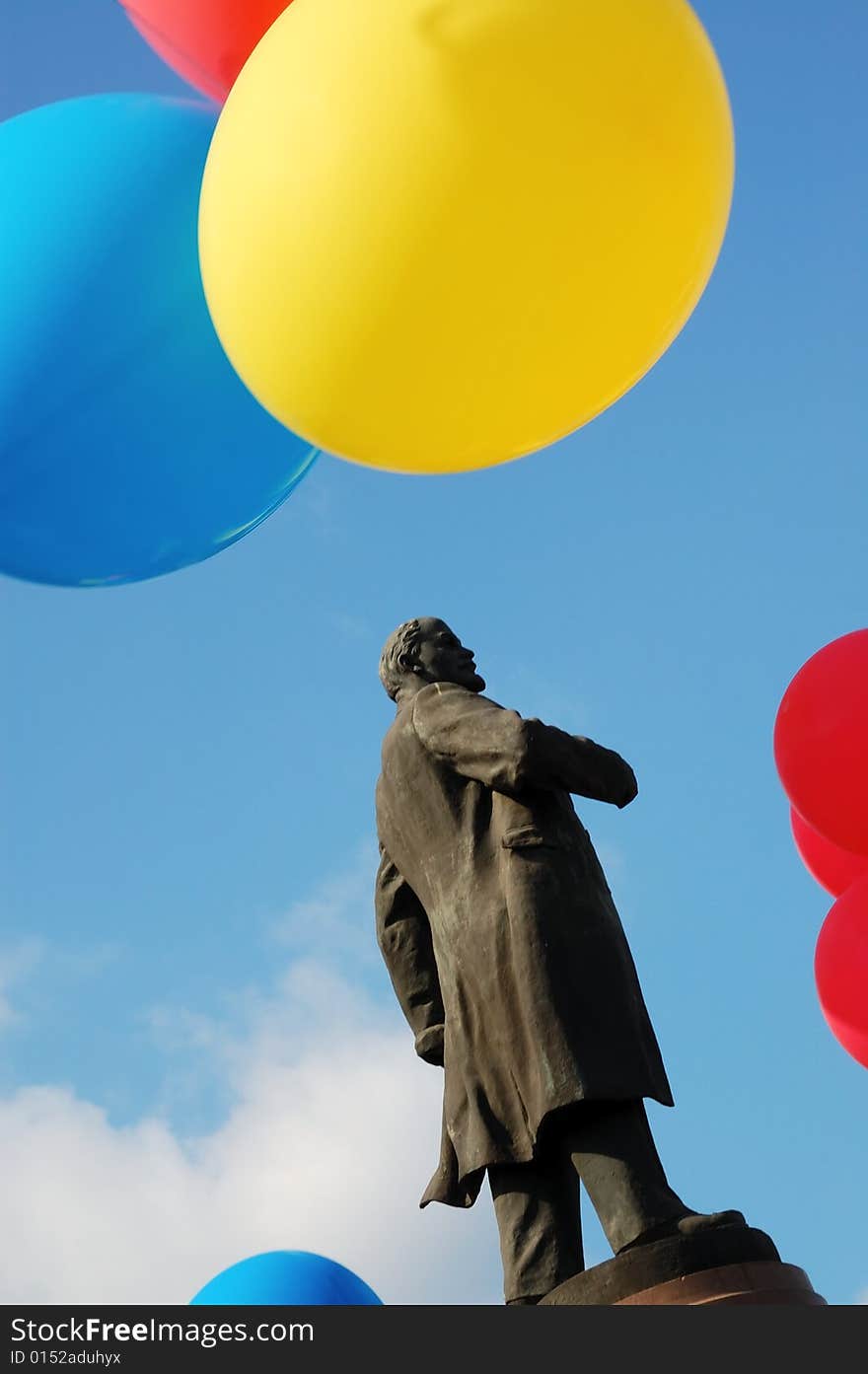 Monument for Lenin surrounded with bright colorful balloons. Monument for Lenin surrounded with bright colorful balloons