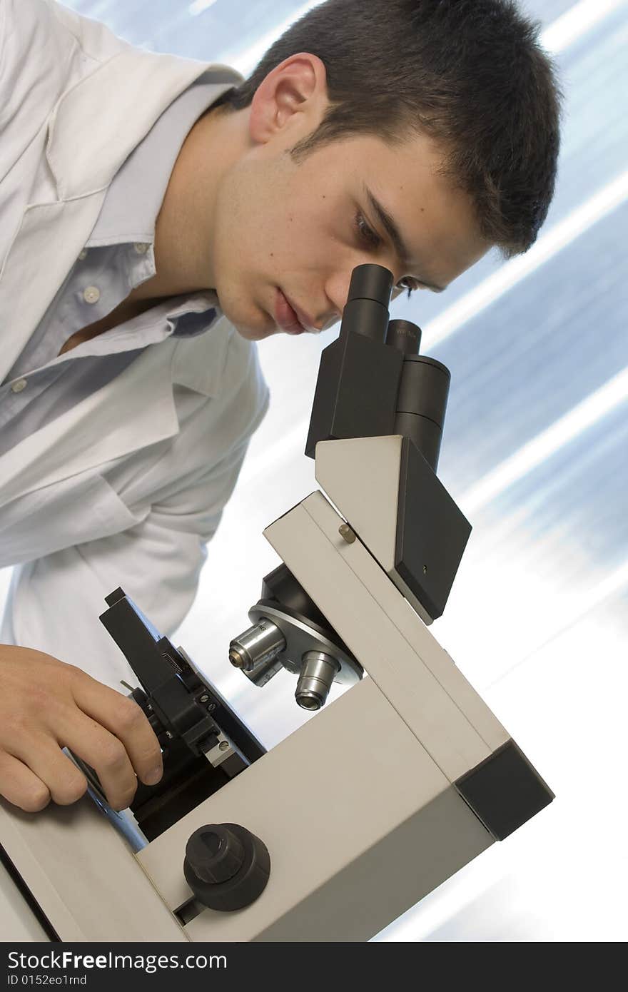 Scientist using a microscope, chemistry related or medical design. Scientist using a microscope, chemistry related or medical design