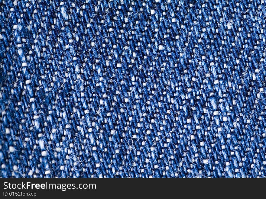 High resolution image of blue cotton denim fabric. High resolution image of blue cotton denim fabric