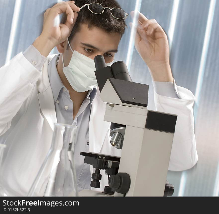 Scientist discovering something at microscope, chemistry related or medical design. Scientist discovering something at microscope, chemistry related or medical design