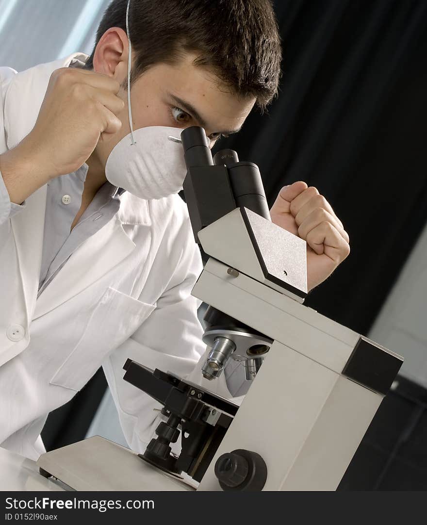 Scientist discovering something at the microscope, chemistry related or medical design. Scientist discovering something at the microscope, chemistry related or medical design