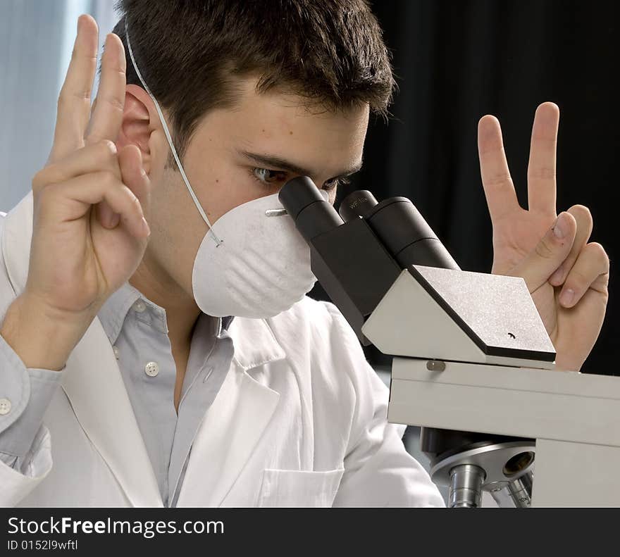 Scientist discovering something at the microscope, chemistry related or medical design. Scientist discovering something at the microscope, chemistry related or medical design