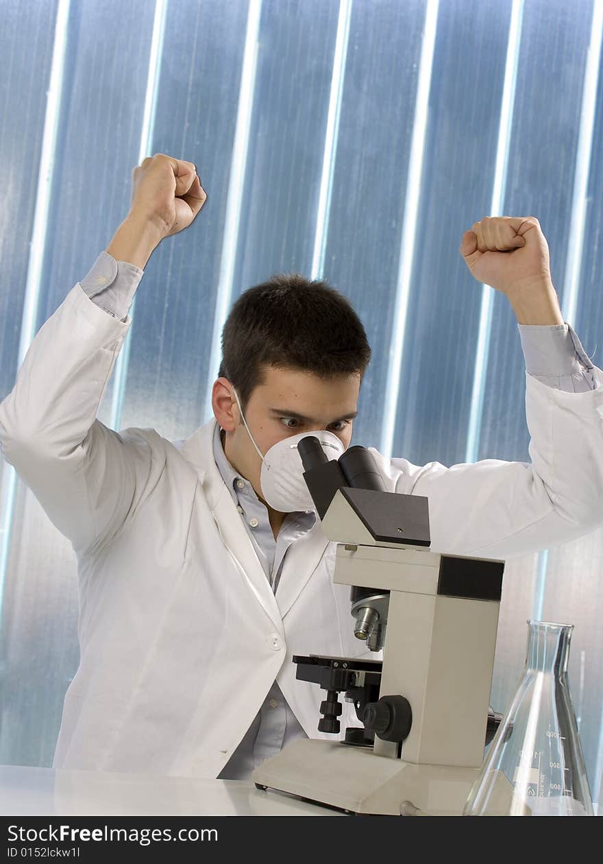 Scientist discovering something at the microscope, chemistry related or medical design. Scientist discovering something at the microscope, chemistry related or medical design