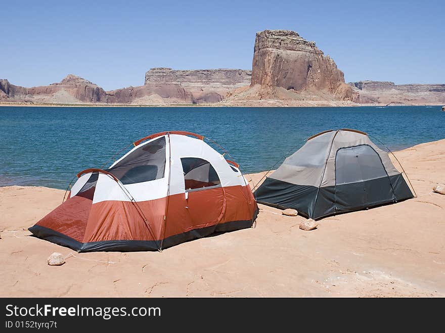 Two tents camping on the beach at the lake. Two tents camping on the beach at the lake