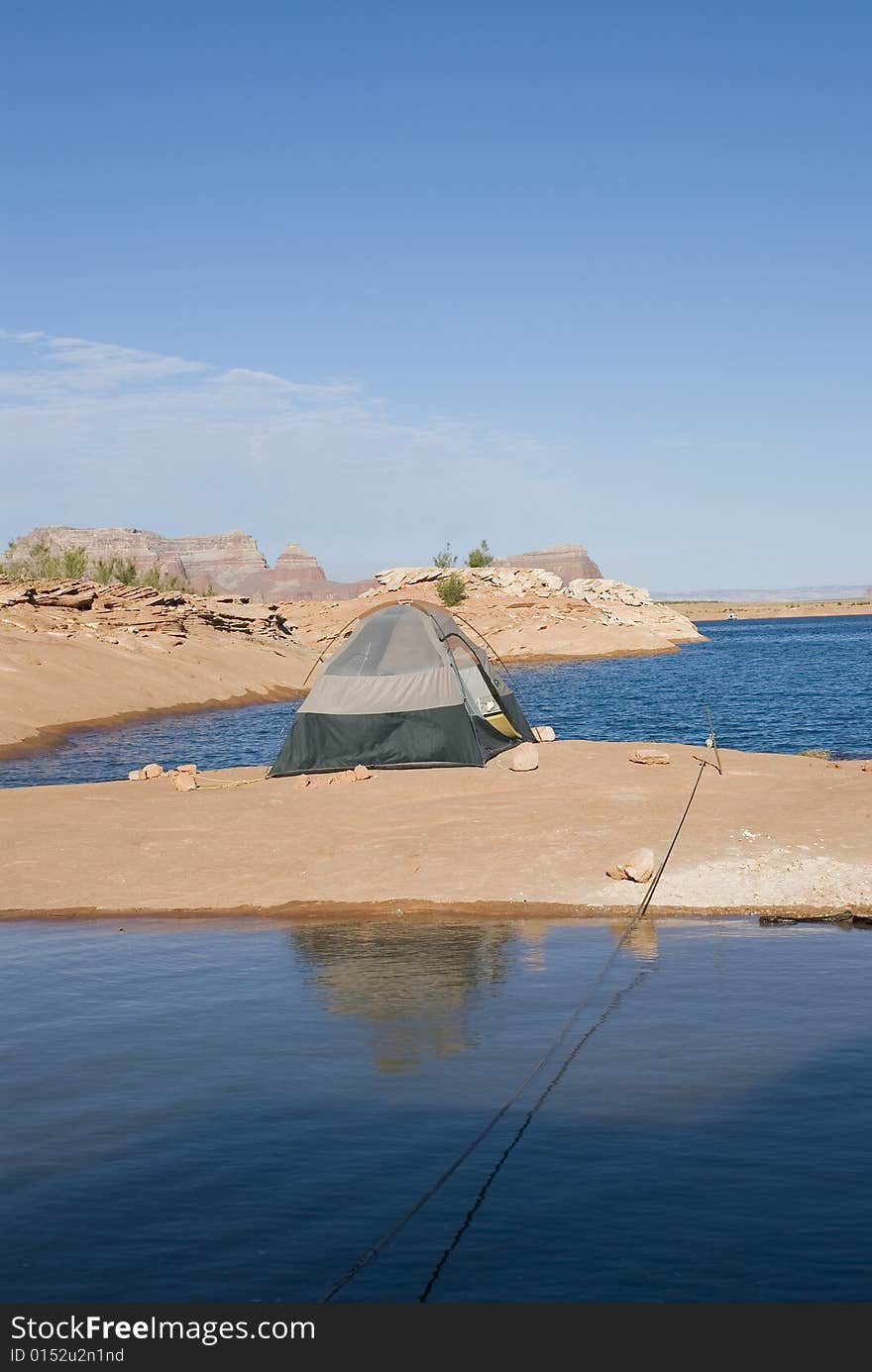 One tent camping on the beach at the lake. One tent camping on the beach at the lake