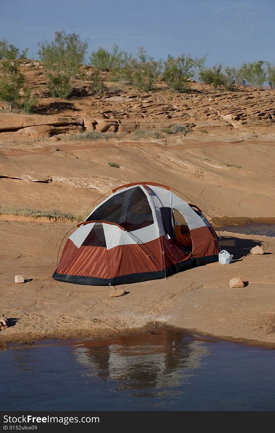 One tent camping on the beach at the lake. One tent camping on the beach at the lake