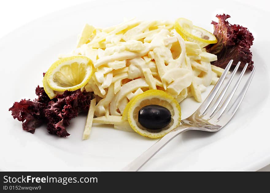 Calamari Salad with Apple under Mayonnaise. Isolated on White Background