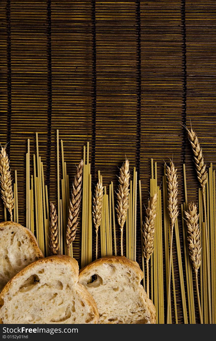 Bamboo board with spaghetti and grain