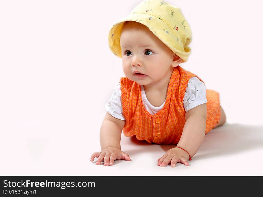 A nice baby-girl crawling on the floor