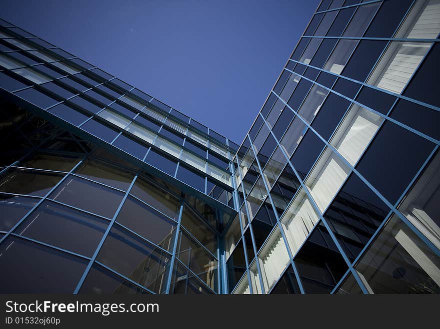 Corporate headqarter under clear blue sky. Corporate headqarter under clear blue sky