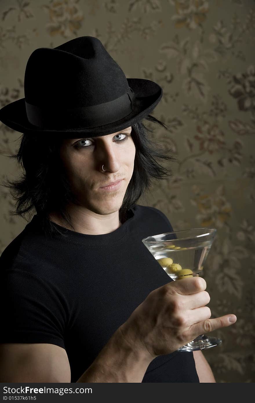 Young Man with a Dark Hat and Martini. Young Man with a Dark Hat and Martini