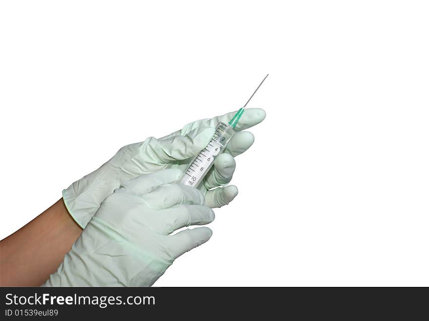 Hands in rubber gloves, hold a syringe. It is isolated, on a white background. Hands in rubber gloves, hold a syringe. It is isolated, on a white background