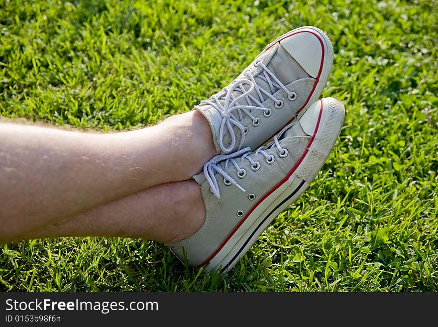 Grey All Star Sneakers on Green Grass