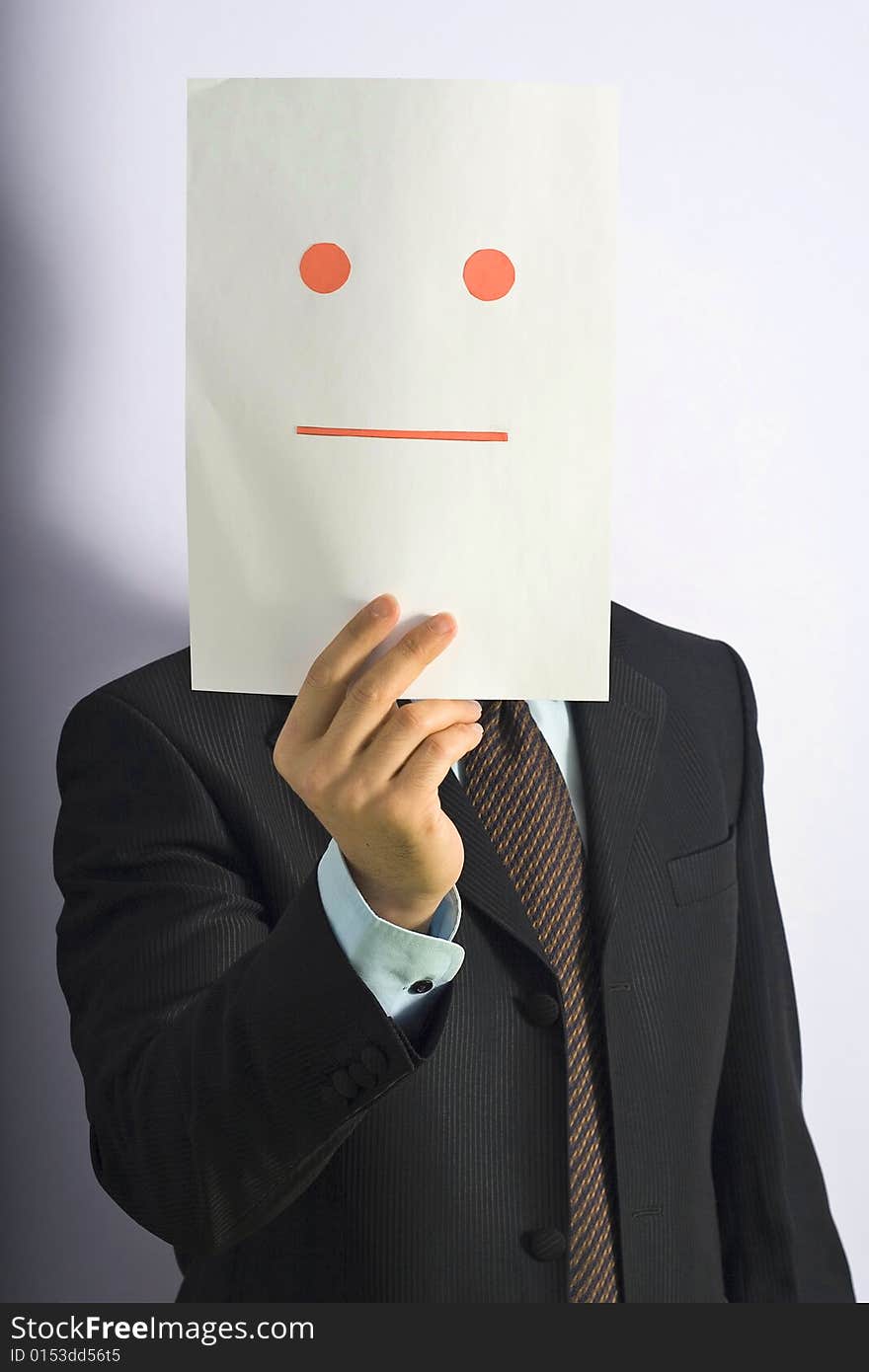 Businessman gesticulating face of paper