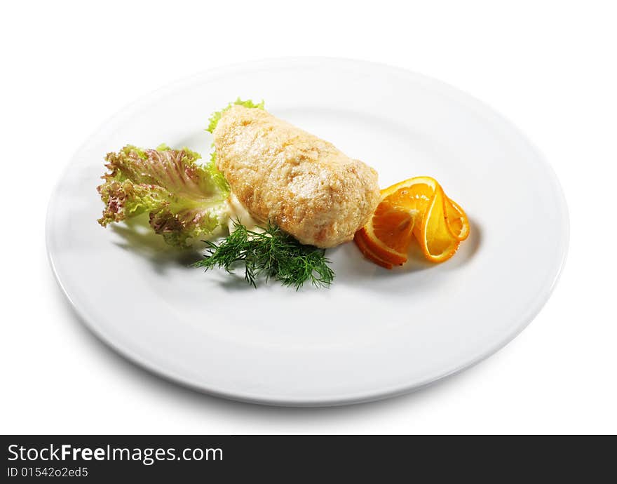 FIlleted Chicken (or Beef) Plate Served with Orange Slice and Salad Leaves. Isolated on White Background