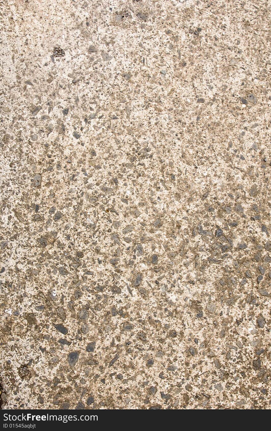 Image of the concrete ground and the material that make up the contrete.