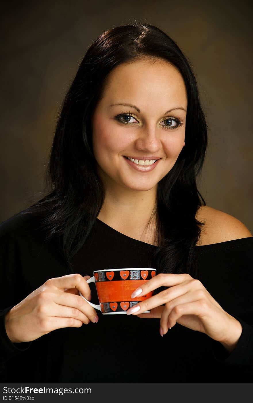 Girl drinks the fragrant coffee