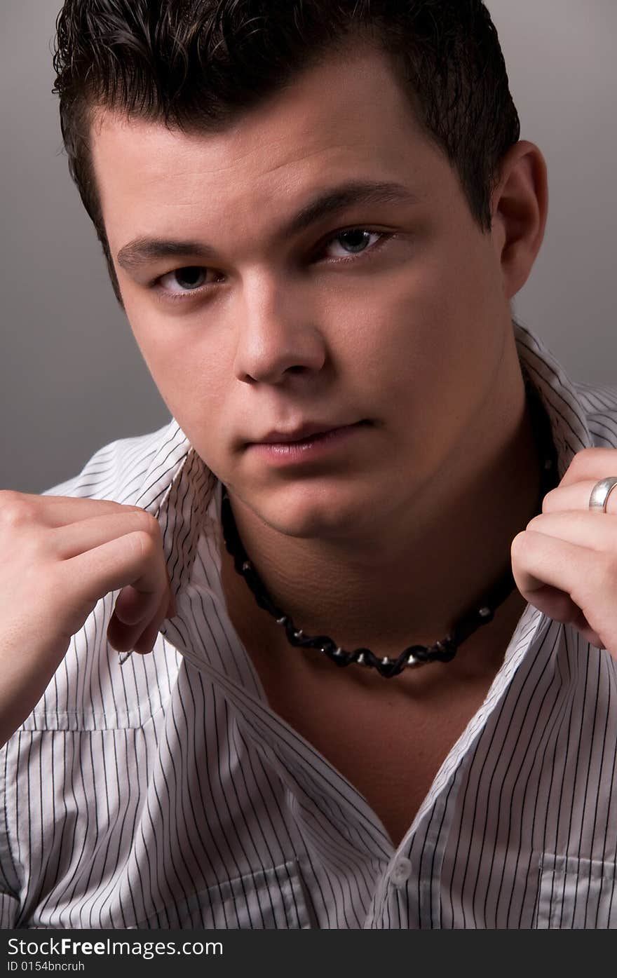 Portrait of young man looking at camera