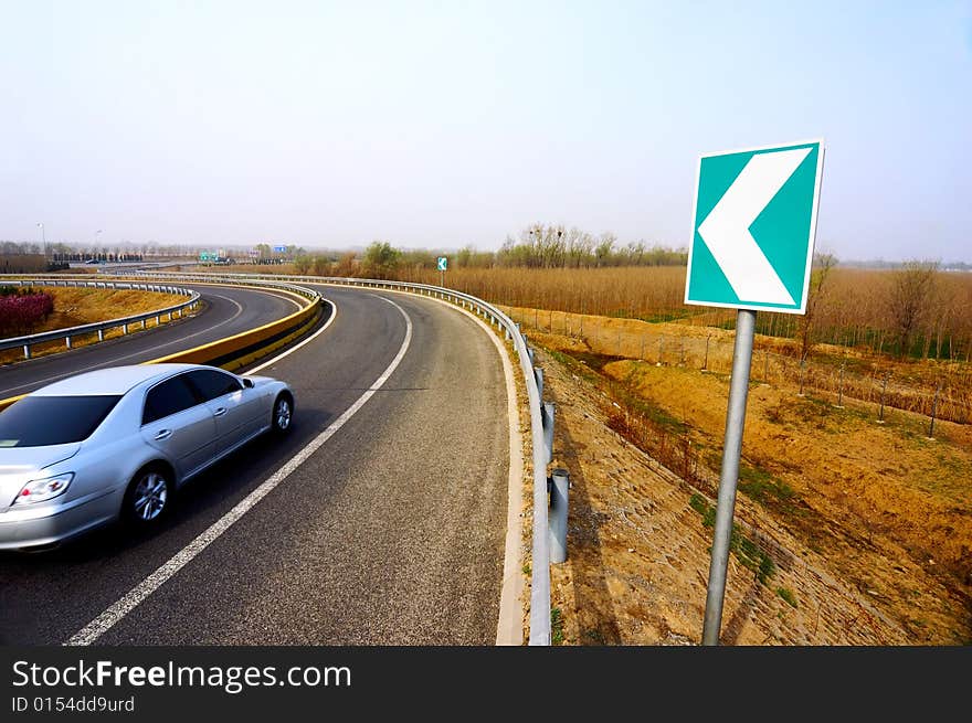 Car in a curve on the highway