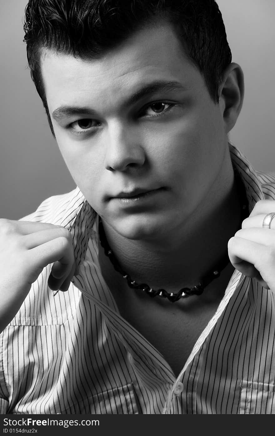 Portrait of young man looking at camera