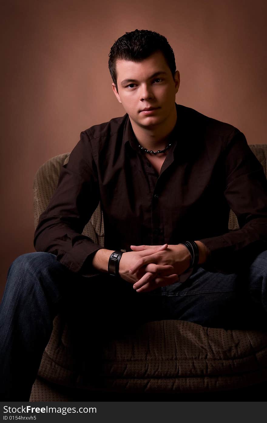 Portrait of young man looking at camera