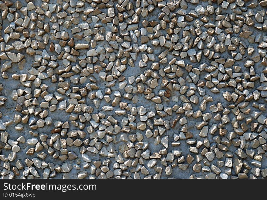 Concrete background with macadam