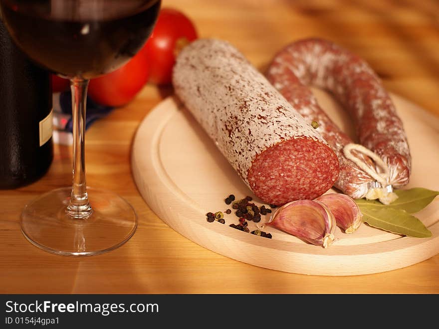 Sausage, tomatoes and wine