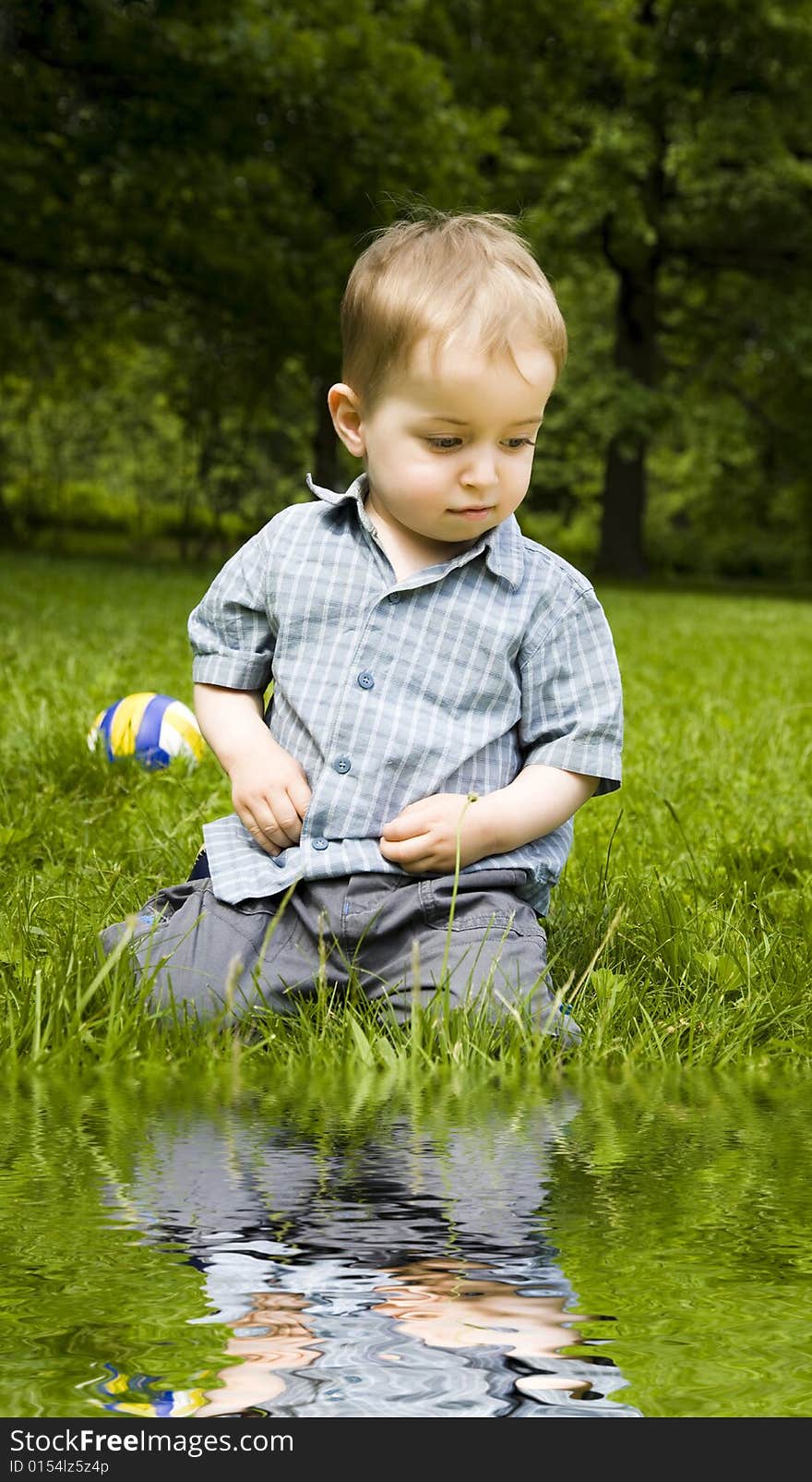 Little Boy On The Meadow