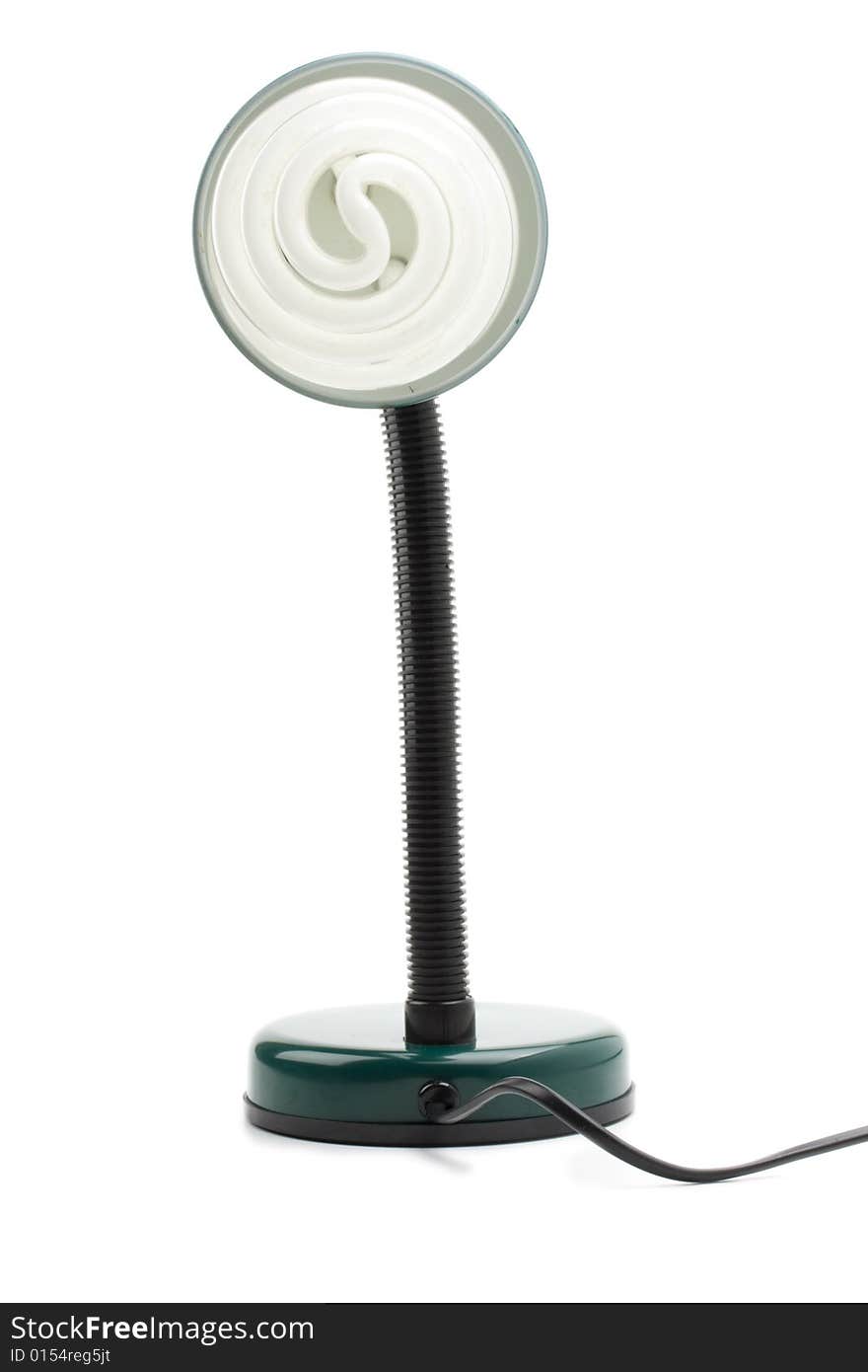 Small flexible green lamp on white background