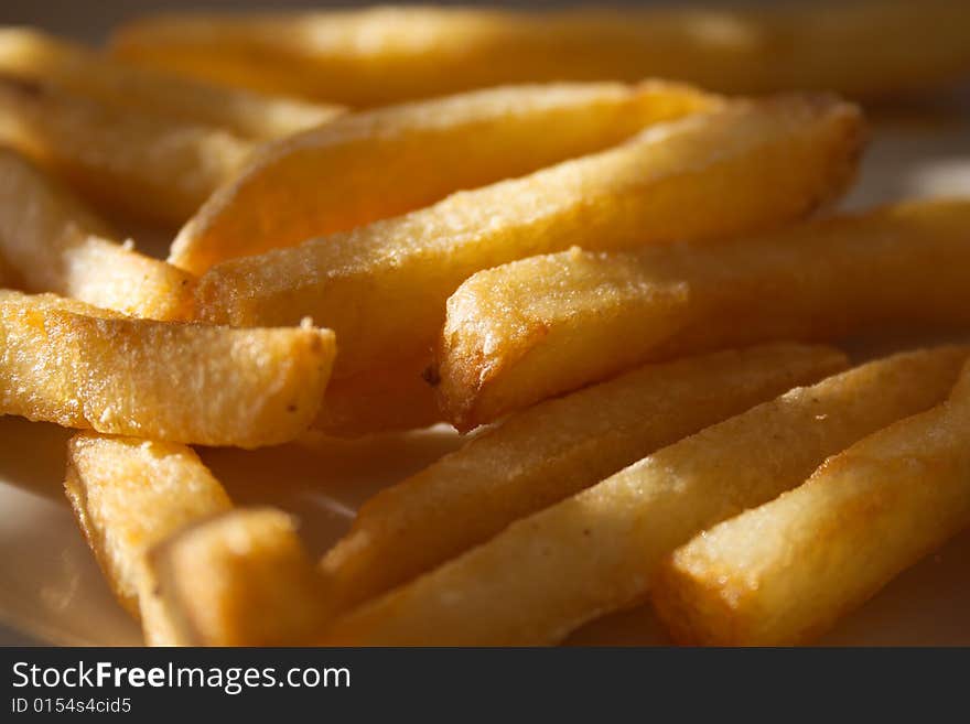 French Fries lit through blinds