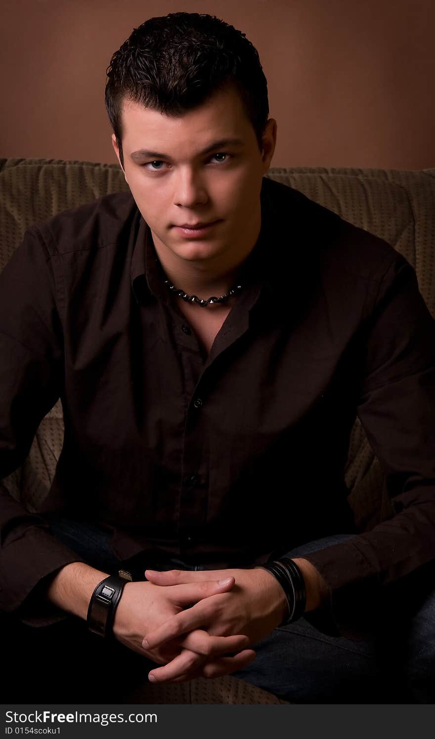 Portrait of young man looking at camera