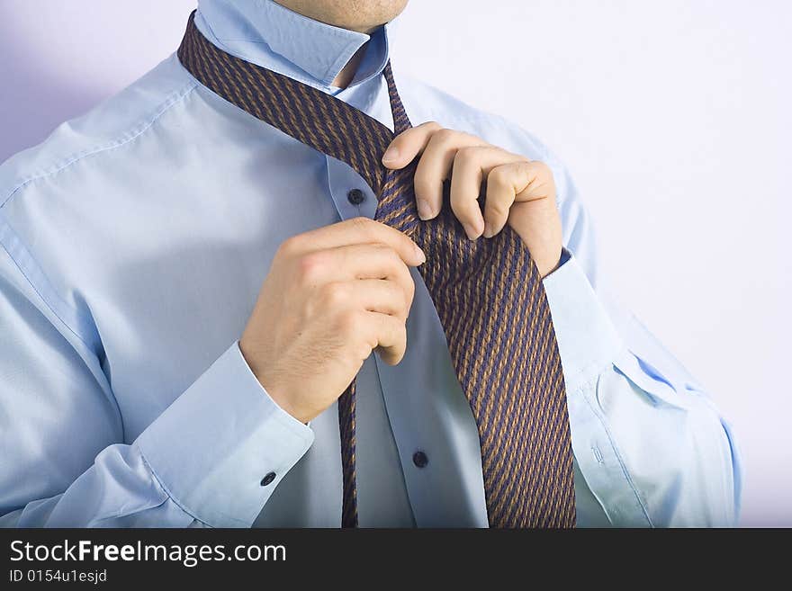 Businessman viewed by his tie knot