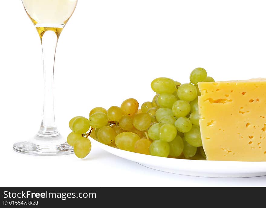 Cheese, grapes and wine isolated on a white background