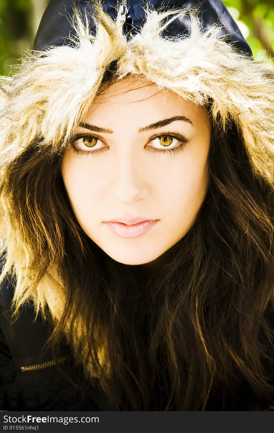 Woman portrait wearing a fur cap.