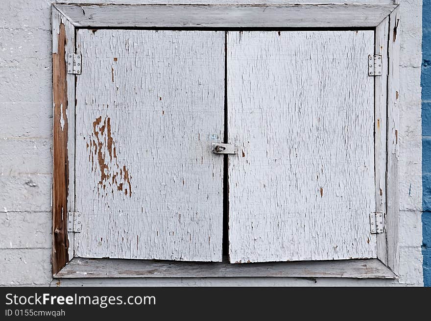 Rustic painted wooden door with metal handles. Rustic painted wooden door with metal handles