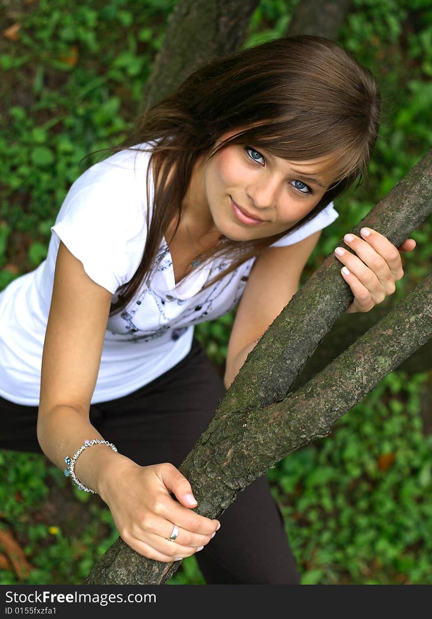 The photo presents young caucasian girl looking at a lens of high resolution camera.
The picture was taken in a serene area among the trees. The photo presents young caucasian girl looking at a lens of high resolution camera.
The picture was taken in a serene area among the trees.