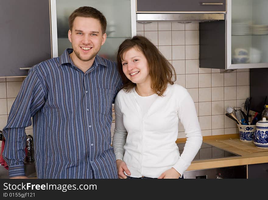 Happy couple together in kitchen. Happy couple together in kitchen