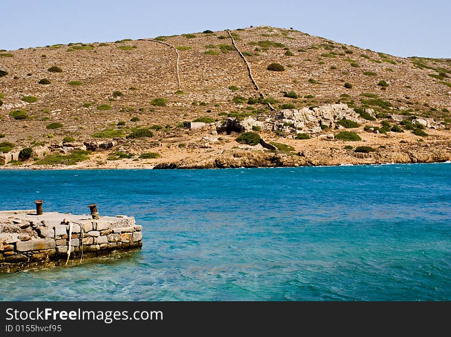 Dockyard at Spinilonga Island, Crete, Greece. Setting of the best selling book The Island. Dockyard at Spinilonga Island, Crete, Greece. Setting of the best selling book The Island