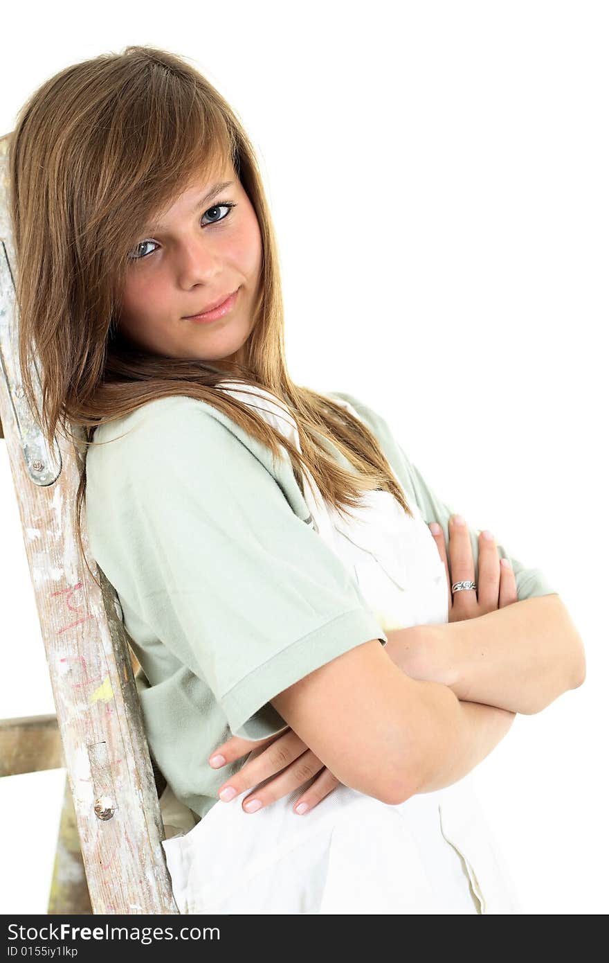 Intriguing girl looking at a lens of a high resolution camera.
The picture is isolated on a white background with a space for text provided