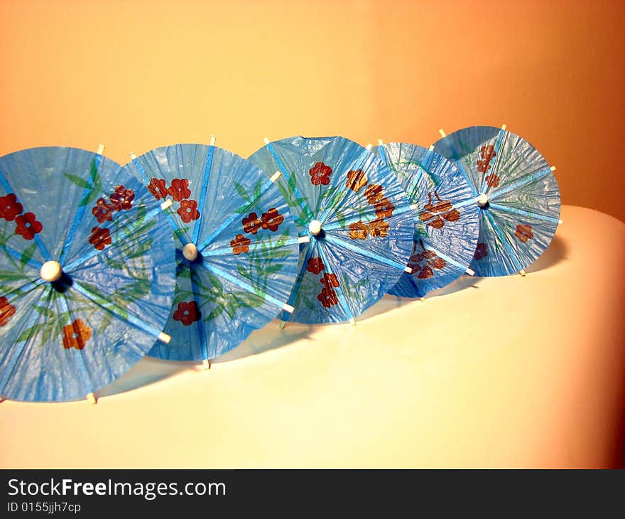 Colorful japanese blue umbrellas for party drinks. Colorful japanese blue umbrellas for party drinks.