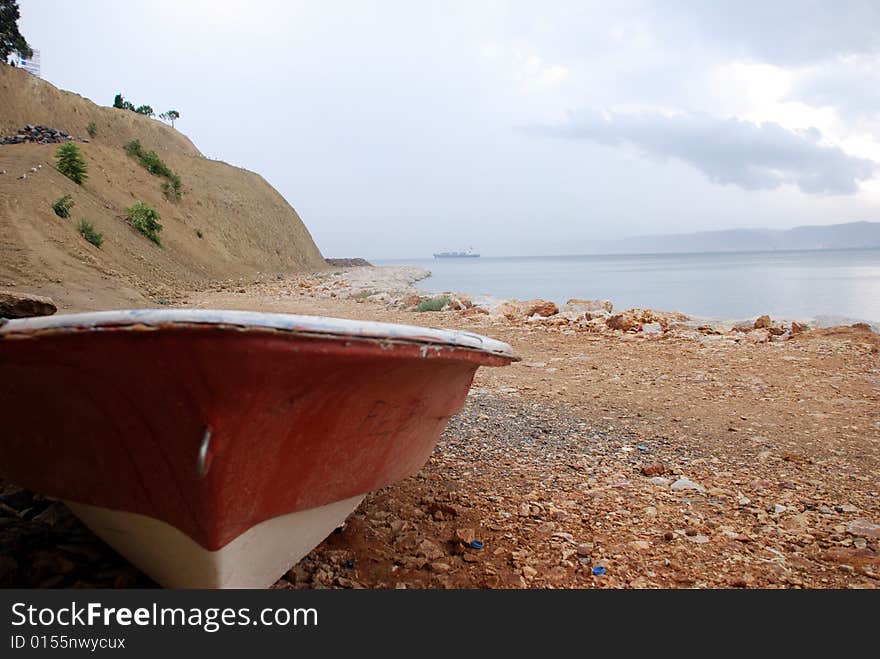 Old rowing boat and sea