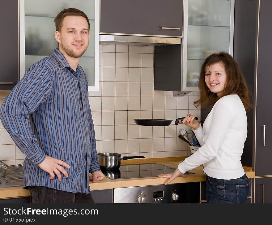 Happy couple together in kitchen. Happy couple together in kitchen