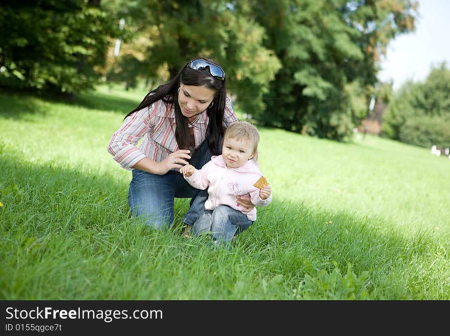 Happy family together in park. Happy family together in park