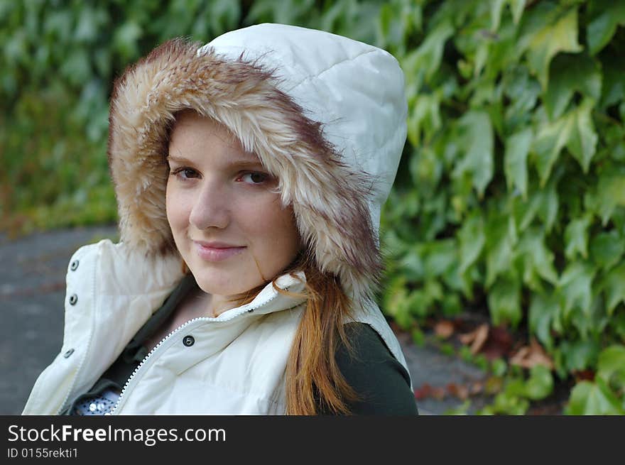 Girl with Hood Poses for Camera