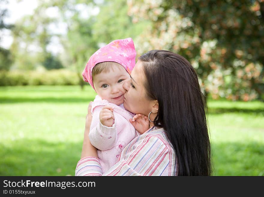 Happy family together in park. Happy family together in park