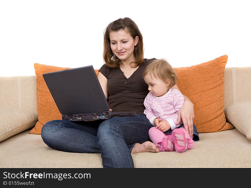 Happy family together on sofa with laptop. Happy family together on sofa with laptop