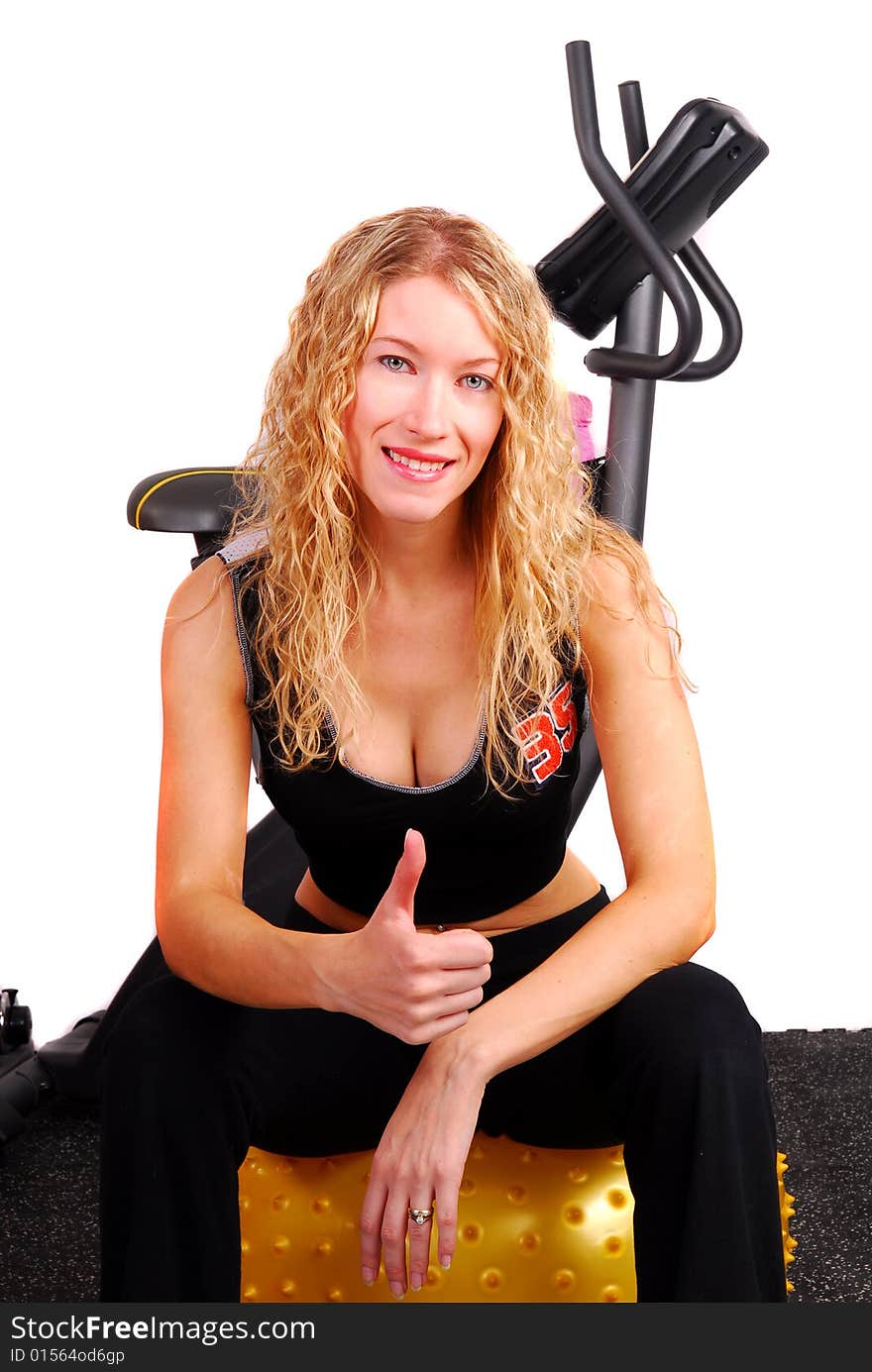 Young Woman Giving Thumbs Up After Workout